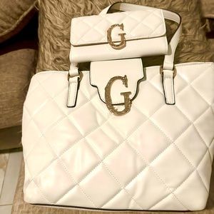 Brand new never used, tag is off. Wallet included